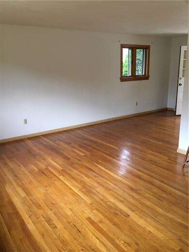 LIVING ROOM TO DINING ROOM AREA .. BEAUTIFUL HARDW