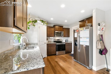 Kitchen with appliances with stainless steel finis