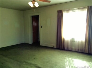 Living Room is spacious.... Hardwoods under carpet