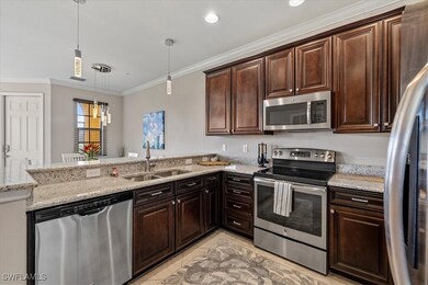 Kitchen featuring decorative light fixtures, kitch