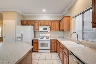 Kitchen featuring white appliances, ornamental mol