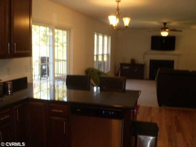 Den/Family/Great Room - Wood flooring in the break