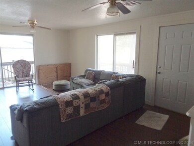 Two sets of slider doors open onto deck and lets i
