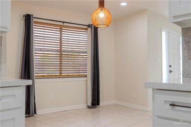 Open area between living room and kitchen