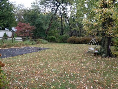 Yard/Garden. Level private yard that backs to wood