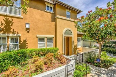 A view as you walk down to this private end unit.