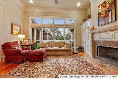 Formal living room overlooks back yard