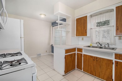 Kitchen towards eat in area