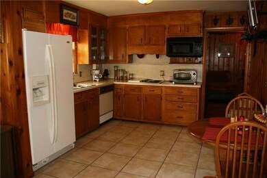 All appliances remain including Cooktop, Microwave/Convection Oven, Dishwasher and Side-By-Side Refrigerator with Icemaker.