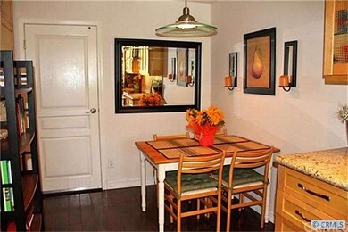 Cozy breakfast nook with contemporary lighting fix
