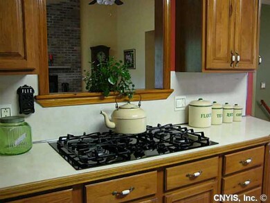 Kitchen. 5 burner gas stove are a delight for cook