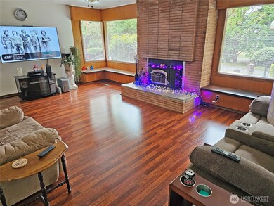 real brick woodburning fireplace with insert to offset utility bills and offer ambiance