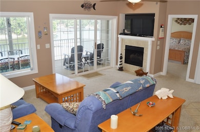 Living room with easy access to screened deck