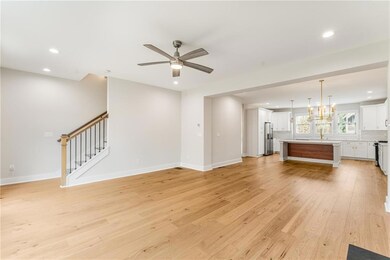 This luxury townhome boasts an open floor plan & c