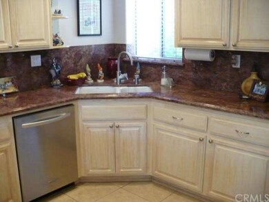 Kitchen with refinished cabinets, granite countert