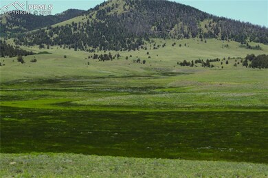 View of mountain background featuring rural landscape
