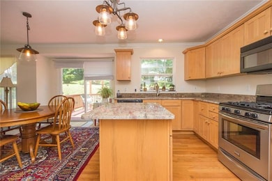 Eat in kitchen with access to deck for easy grilli
