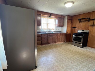Kitchen featuring stainless steel appliances, sink