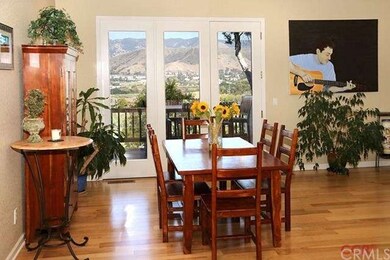 Dining room with doors exiting to the view decks.