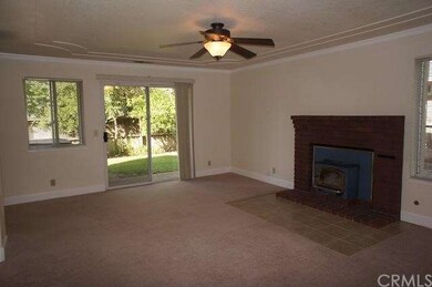 Family room off kitchen with fireplace/woodstove i