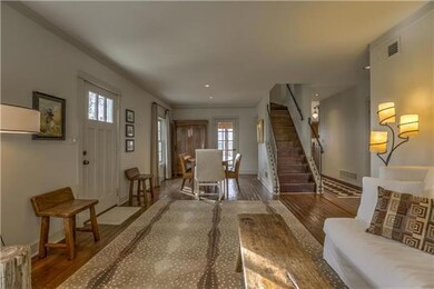 Open and inviting, the living room and dining area
