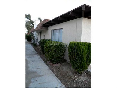 Property Photo. Side walkway to front door entranc