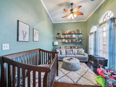 Sitting room located at the front of the home, makes a great flex space for office or even a reading room