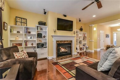 Spacious family room with fireplace and built-ins,
