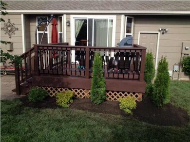 View of deck. Check out the beautiful landscaping