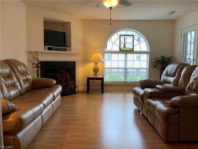 Large, open living room with gas fireplace