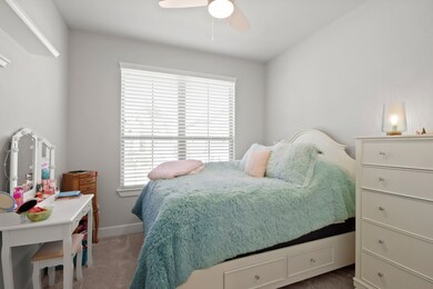 Off the entry is a spare bedroom.