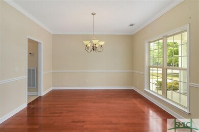 Dining room with access to the kitchen.