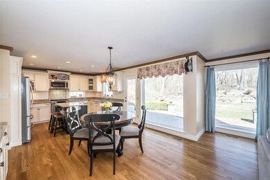 The kitchen was redesigned to bring the great indoors back into the home by way of the Provia picture windows.  You can hardly look at anything else when you are standing in this bright and beautiful room!