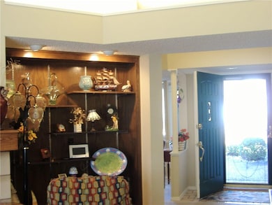 kitchen to left and 2 BD/BA to right of entry