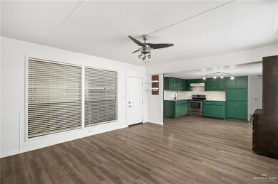View of open floor plan with living room open to the newly remodeled kitchen.