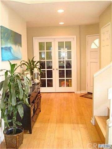 French doors lead to downstairs bedroom. No closet