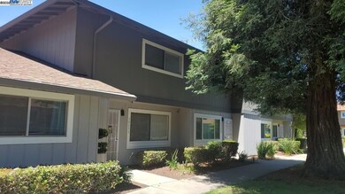 another front of house photo, showing more of the second floor. great curb appeal for guests and future resale value or even for renting out, as unit has no rental restrictions, except that a fully executed lease be in place