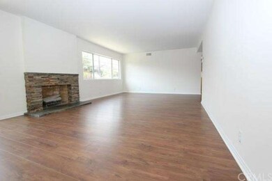 Huge living room with custom rock fireplace.