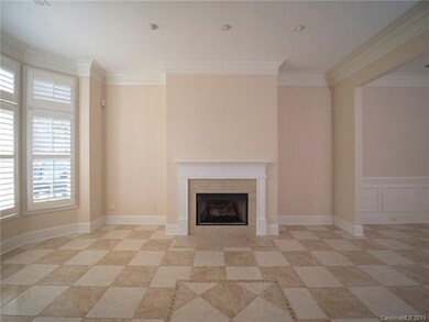Living room with Fireplace and bay window.