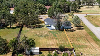 Featuring a 1.11 acre lot that is fully fenced, yo