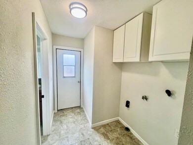 Laundry Room, with Cabinets.