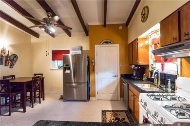 Kitchen is large enough to accommodate a nice size