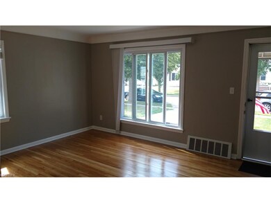 Come in and enjoy the bright living room with its 