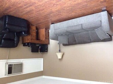 Living area, laminate flooring and wall unit coole