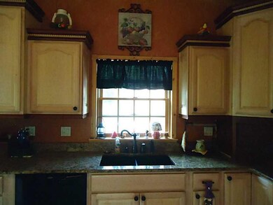 Kitchen. Custom kitchen with granite counters.