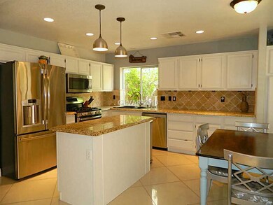 Kitchen. Updated cabinets with under-mounted light