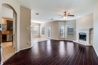 Lovely hardwoods and a cast stone gas fireplace.