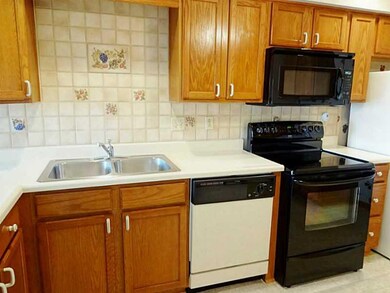 Kitchen. Beautiful back splash adds an upscale feeling to this 14x9 Kitchen. All appliances included.