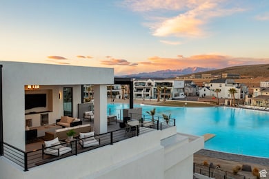Pool with an outdoor living space and a patio