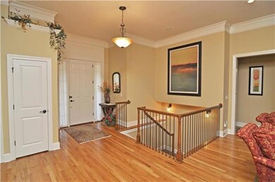 Note the rich moldings, zero entry front and garag